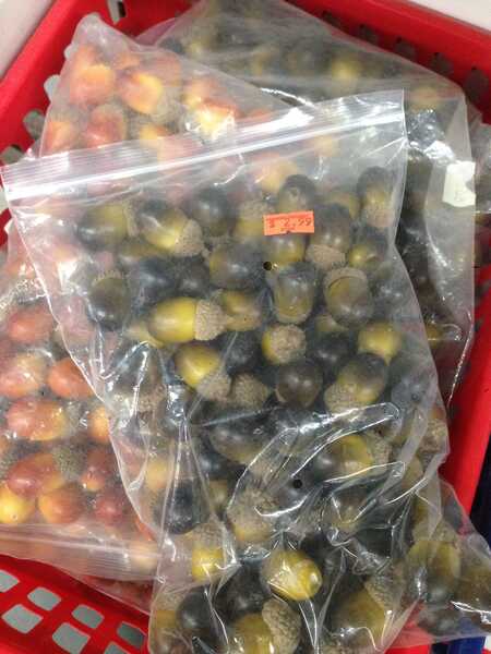 a bag of fake acorns