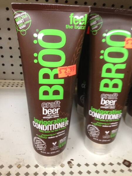 a bottle of 'BROO' 'craft beer' 'envigorating' conditioner