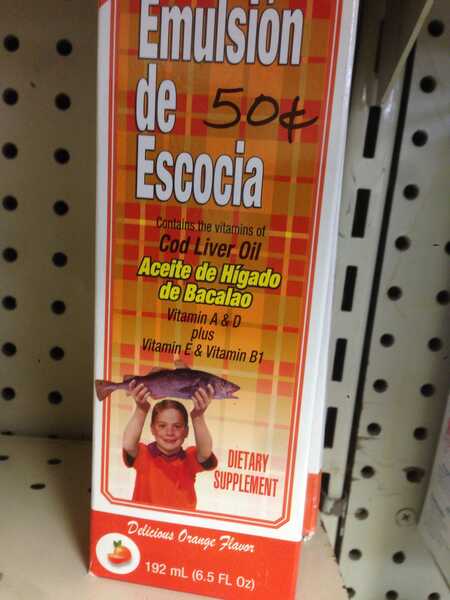 cod liver oil dietary supplement that reads, "emulsion de escocia" and has a child with tightly combed hair holding out a fish